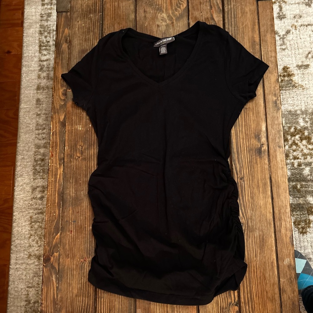 A pea in the pod maternity shirt with side rouching ..Size M